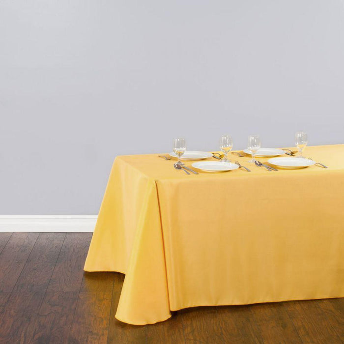 90 x 132 in. Rectangular Polyester Tablecloth Gold